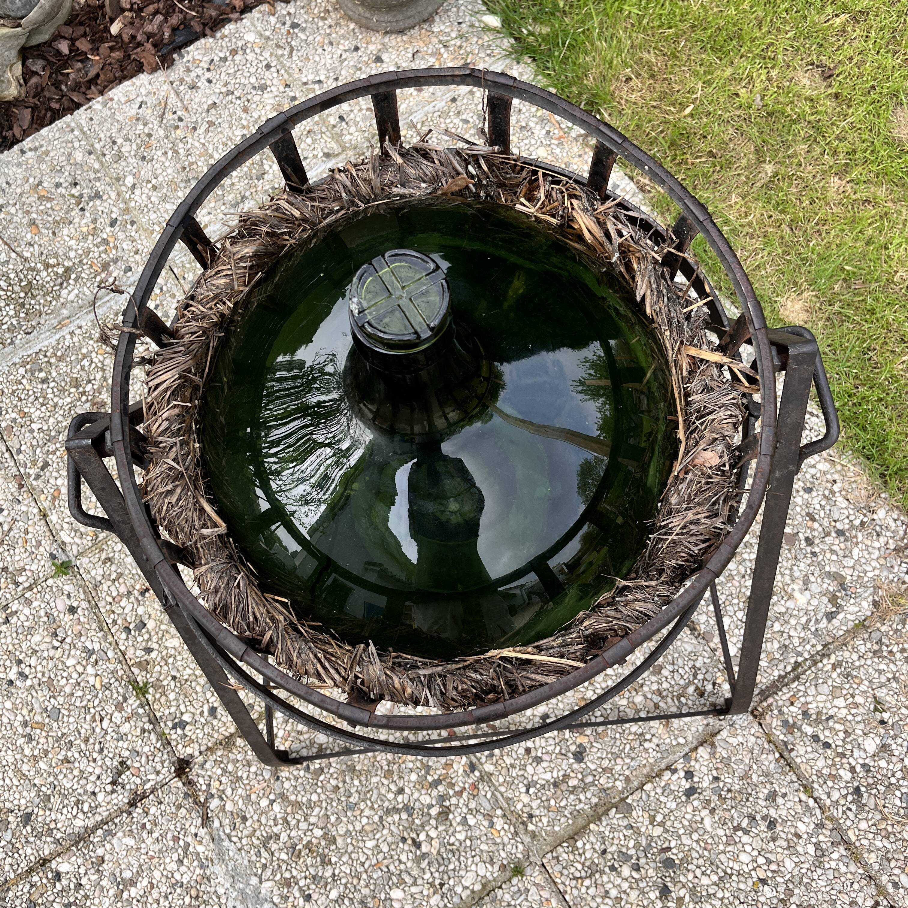 Demijohn on steel rocker