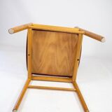 Suite of six chairs in oak and leather