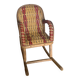 Antique miniature rocking chair in rattan for dolls.