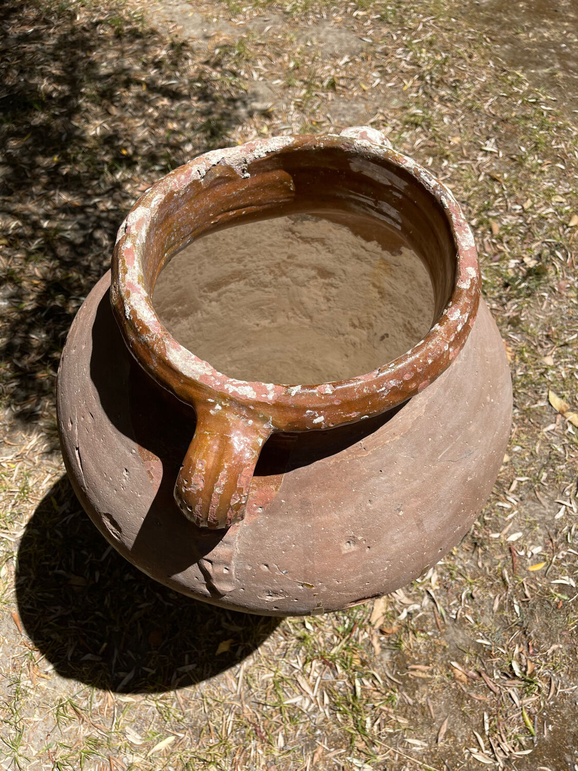 Ancient terracotta pottery jar