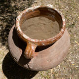 Ancient terracotta pottery jar