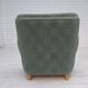 Fauteuil danois des années 1960, en laine de mobilier vert clair, avec des pieds en bois de chêne.