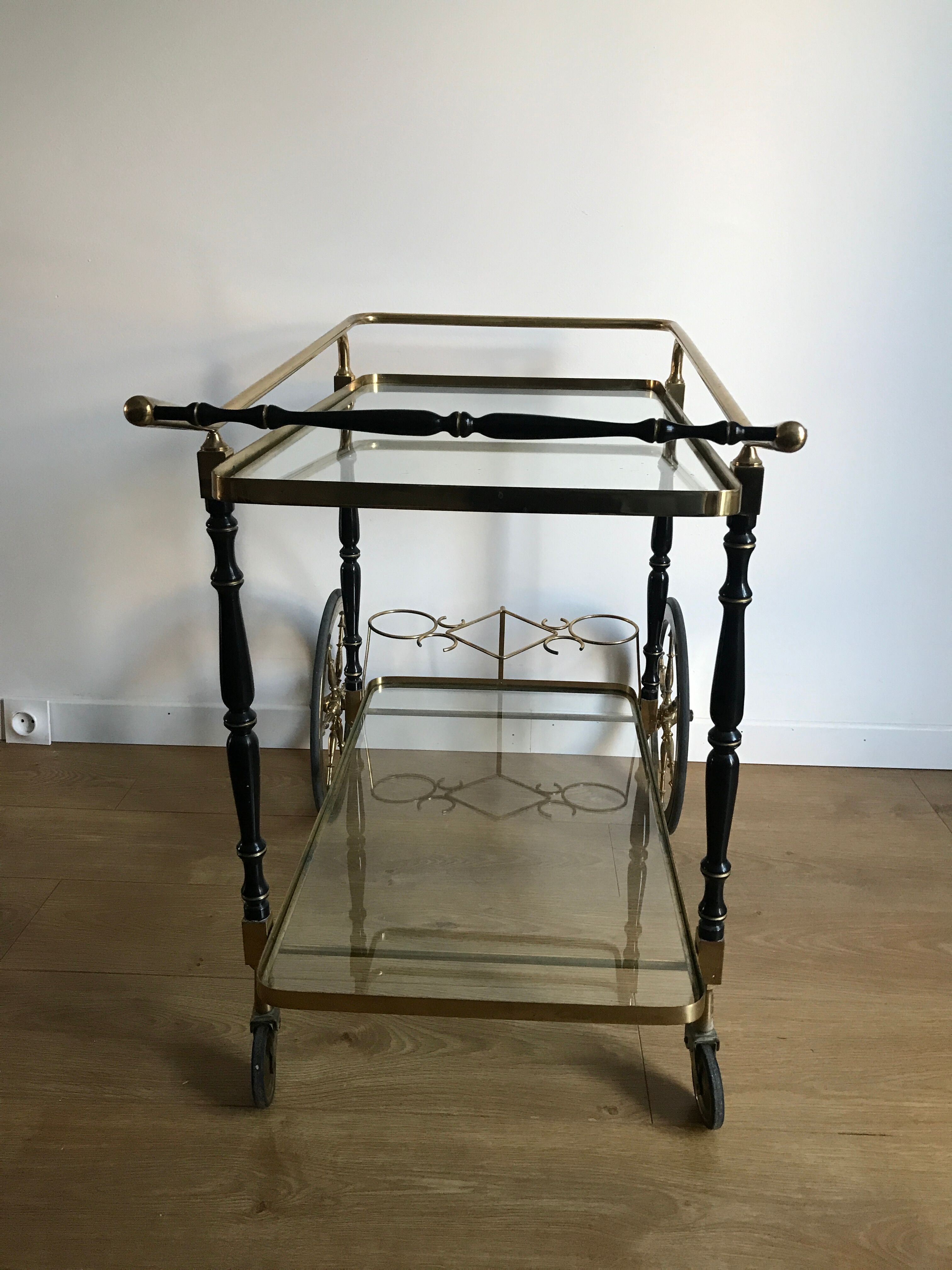 Vintage rolling golden and black dessert in brass and glass