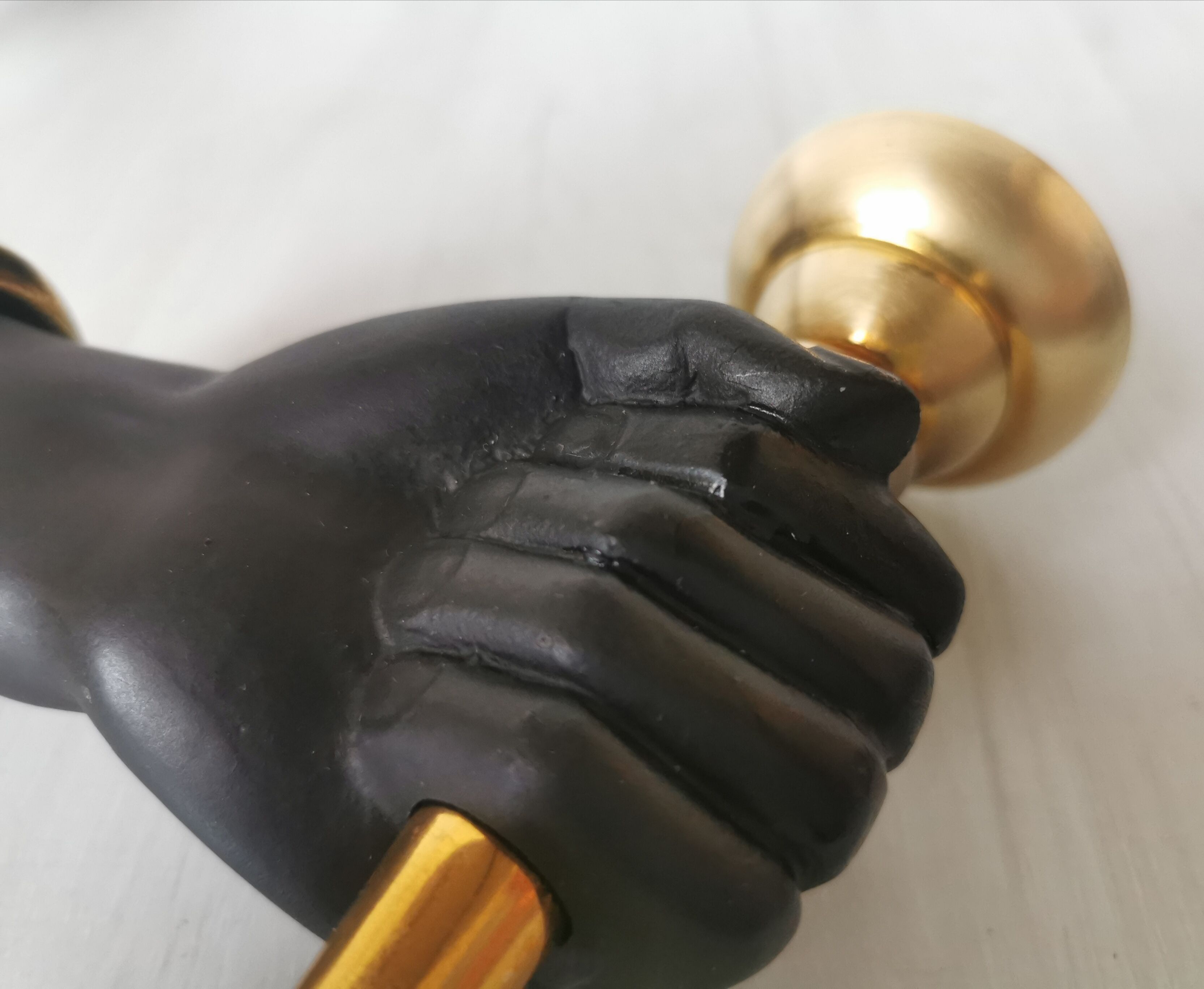 Pair of brass hand flare appliques