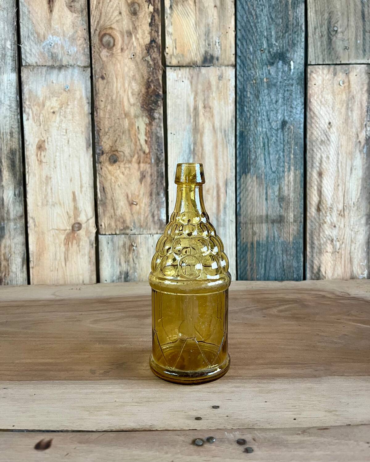 70s yellow glass bottle