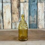 Bouteille 70s en verre jaune