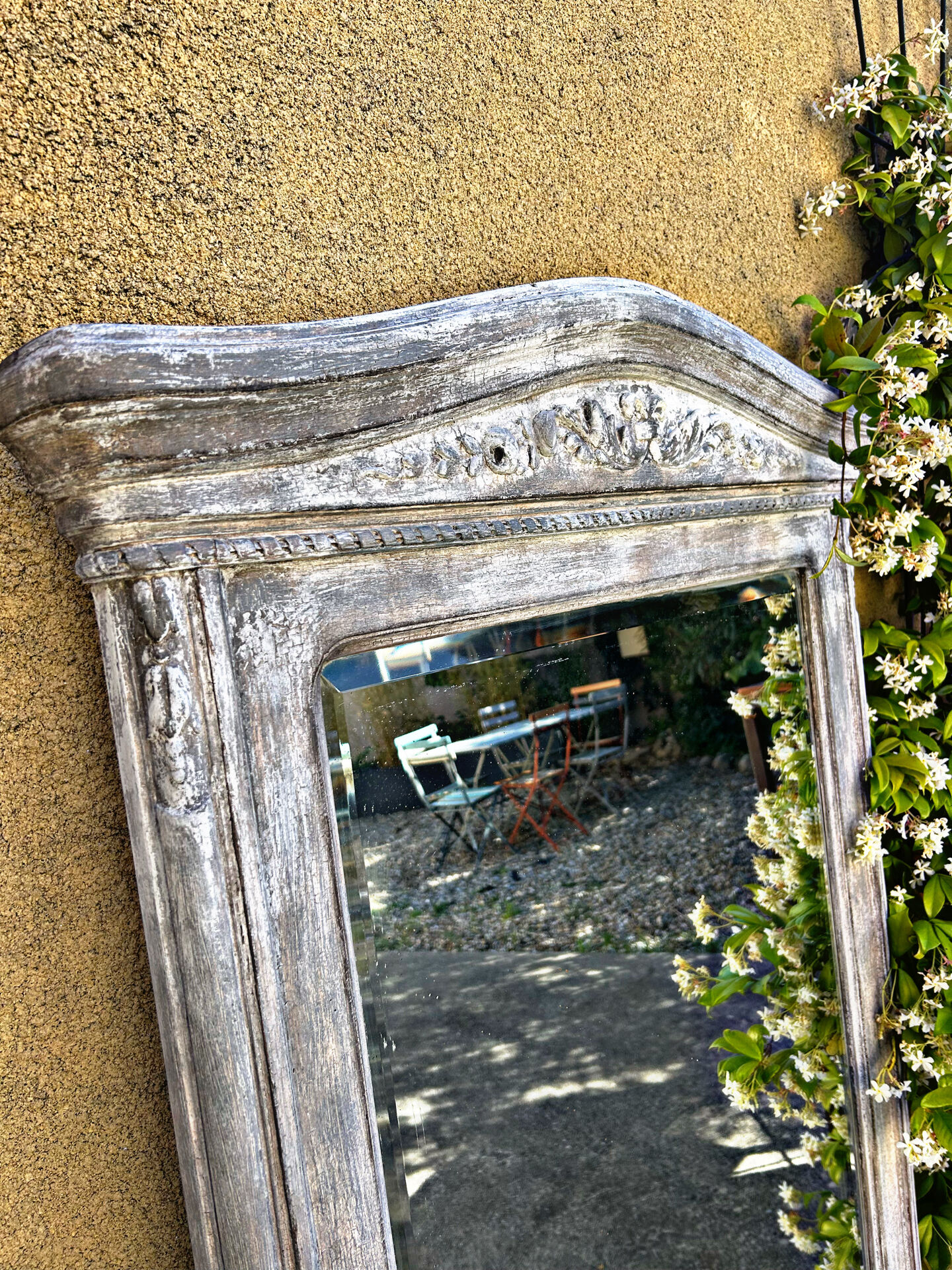 Napoleon III patinated trumeau mirror