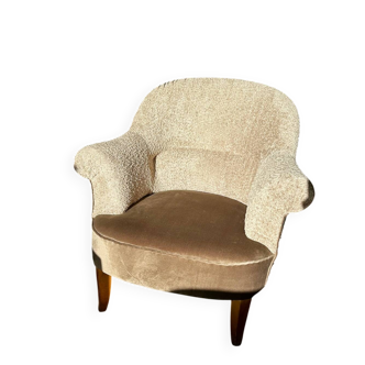 Fully restored beige and graphic armchair.