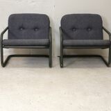Pair of Prisunic edition armchairs, tubular steel and foam cushions, France, 1973