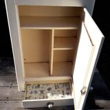 Old bathroom wardrobe in sheet metal of the 50s