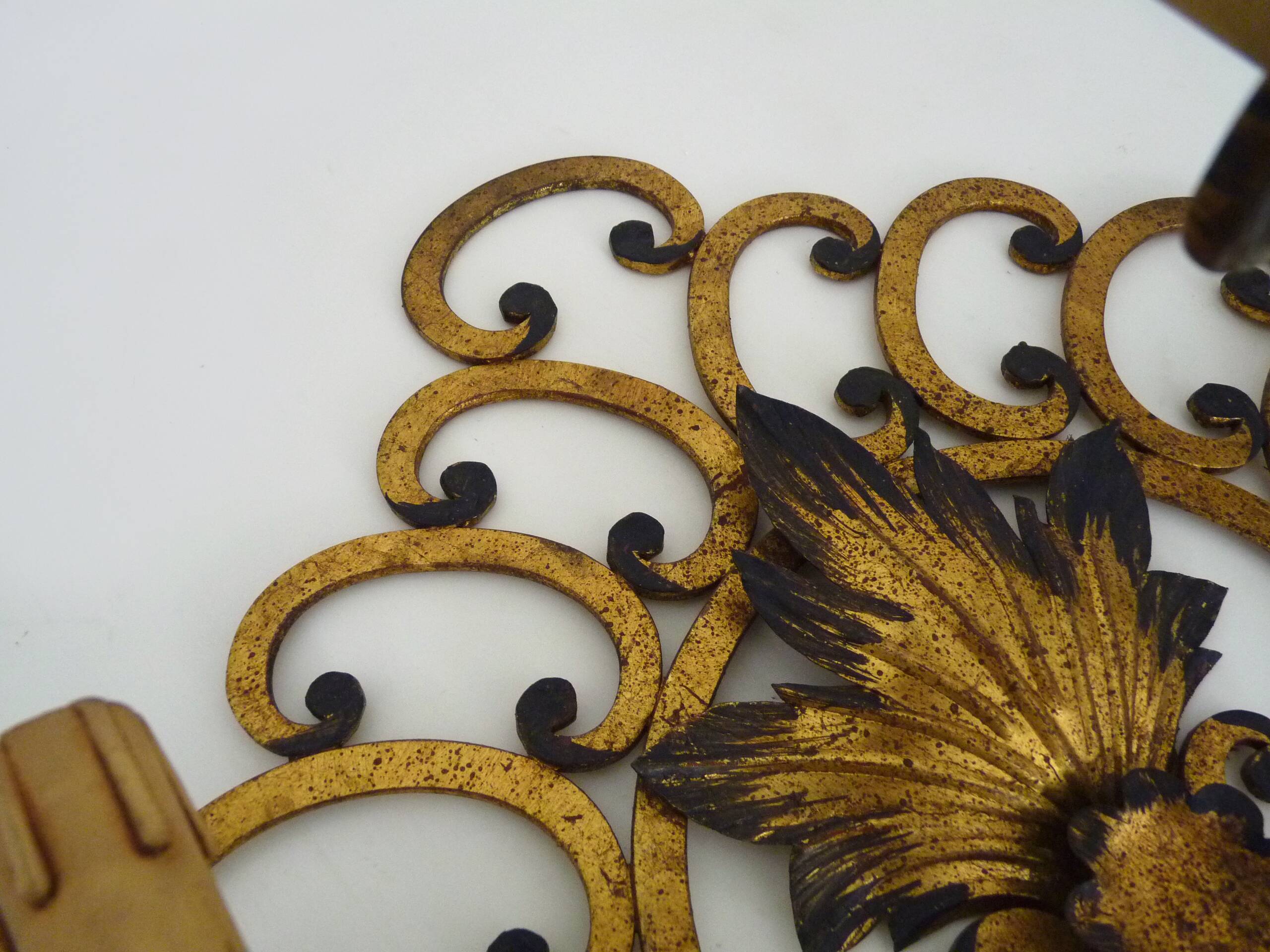 Large pair of Italian wall sconces in gilded wrought iron, 3 lights. 50