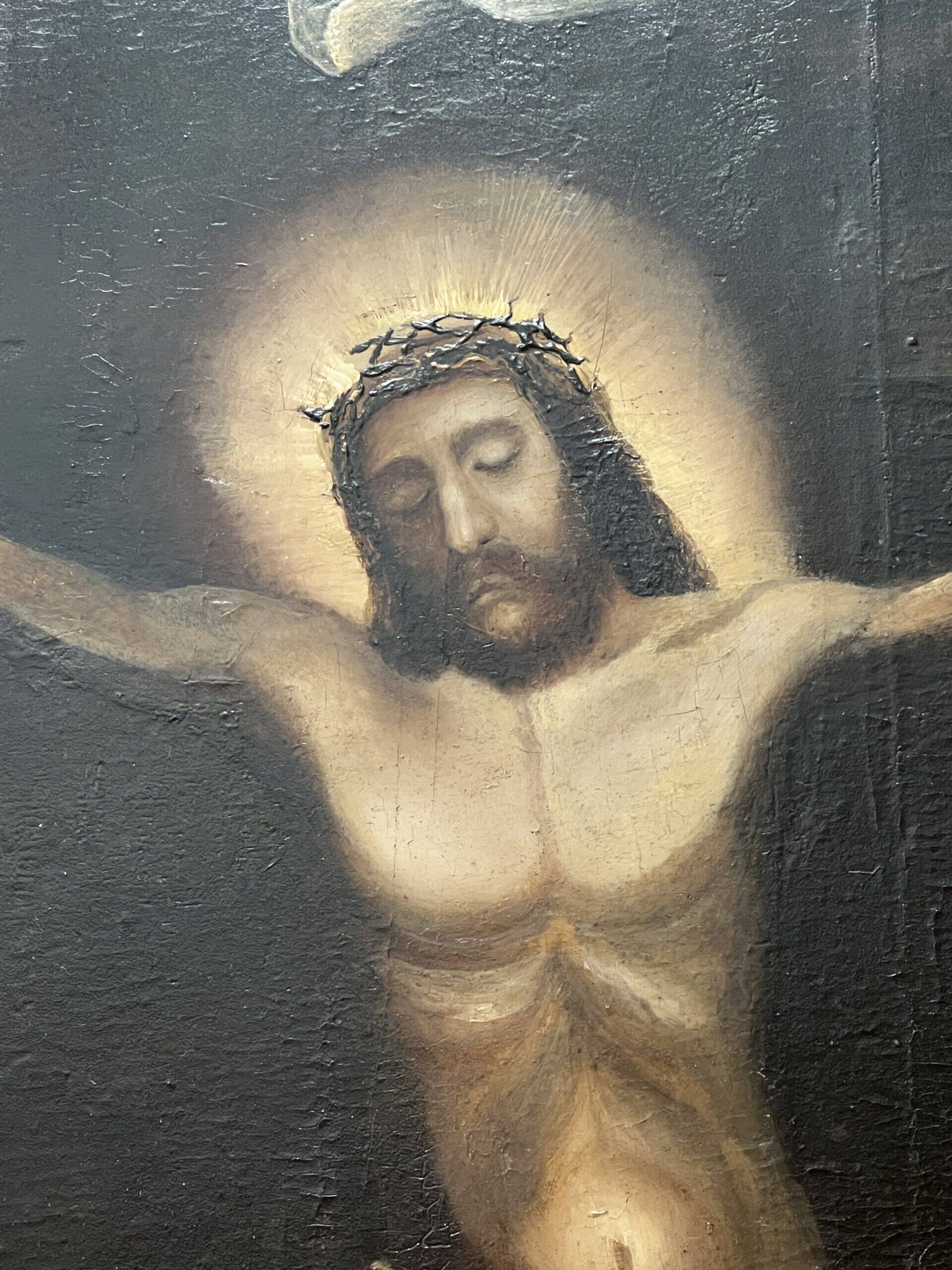 Beautiful religious work from the 17th century, oil on panel representing Christ on his cross with Mary Magdalene at his feet