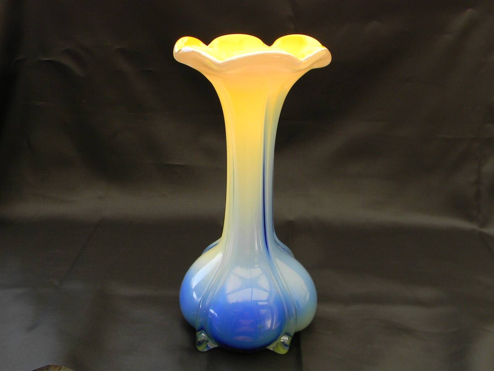 Small blown glass vase in murano style.
