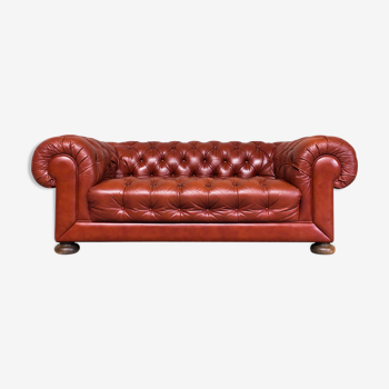 Padded classic sofa in cognac leather