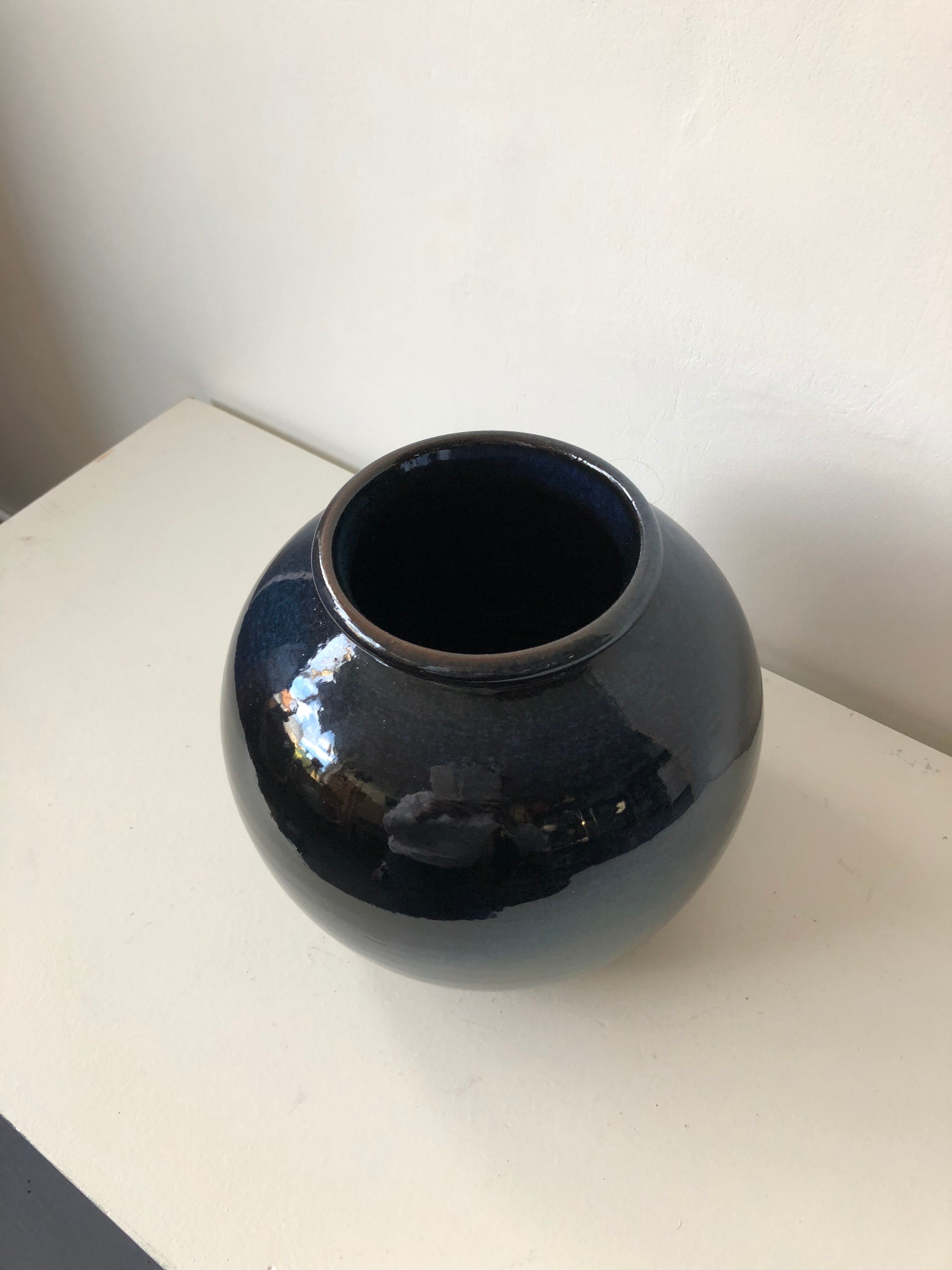 Glazed blue ceramic vase