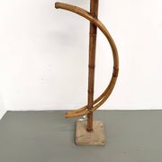 Sculptural floor lamp in bent rattan