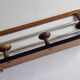 Vintage wall mounted coat rack in wood and metal, 3 hooks, retro style