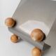 Silver metal magazine rack with wooden ball feet - Space Age 1980s retro storage