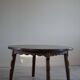 Mid-century modern round Danish side table in solid stained oak, 1960s.