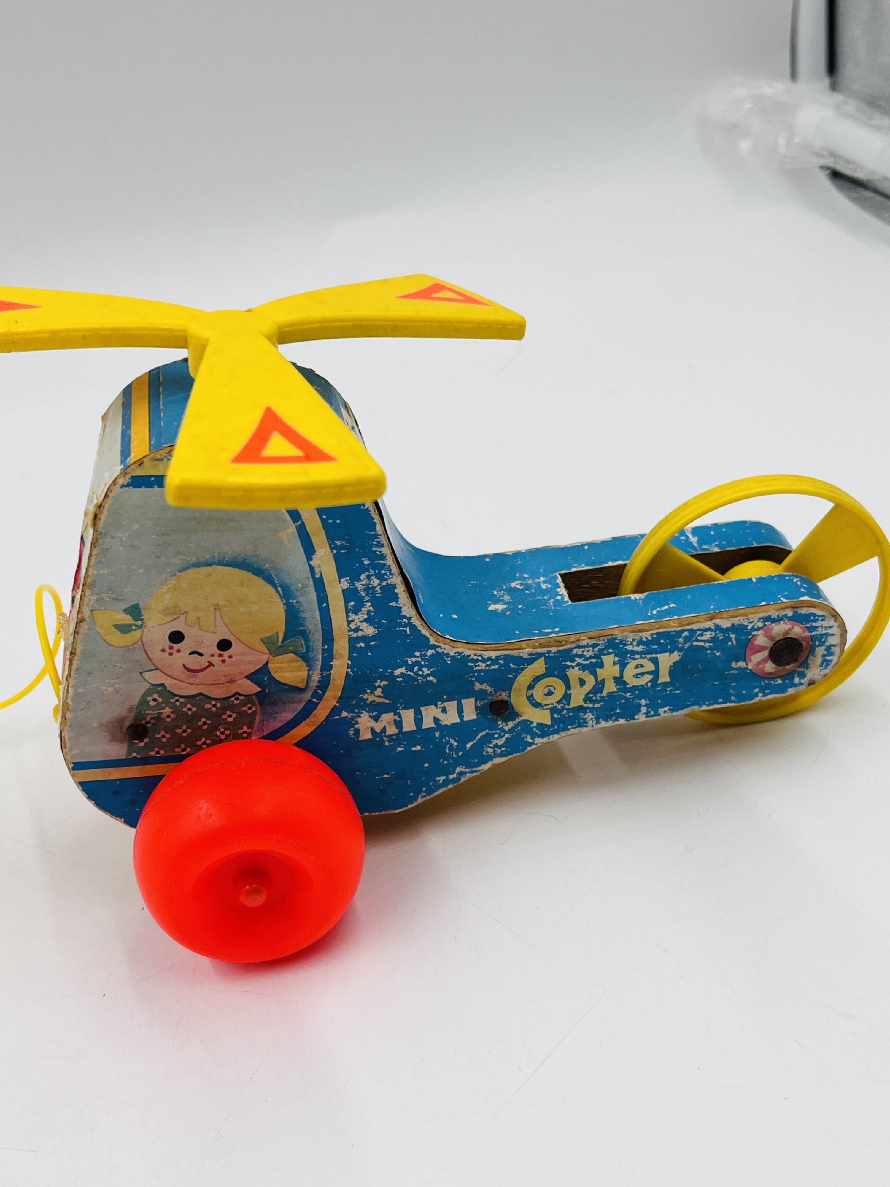 Set of 4 Fisher-Price wooden toys from the 1960s