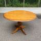 Round table in solid pine with a central baluster leg from 1980.