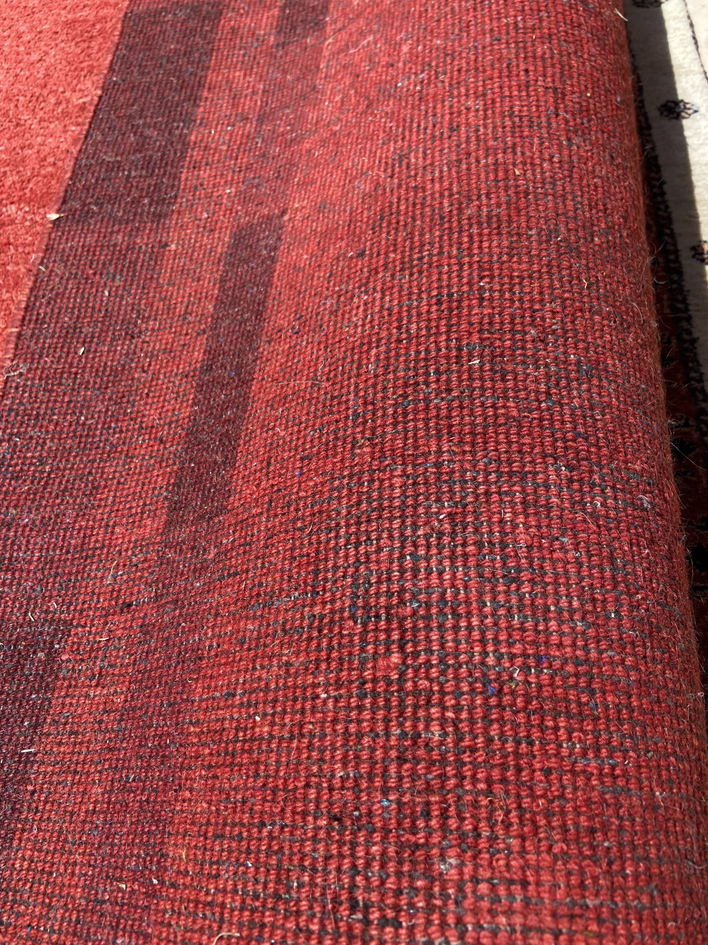 Handwoven carmine red gabbeh rug