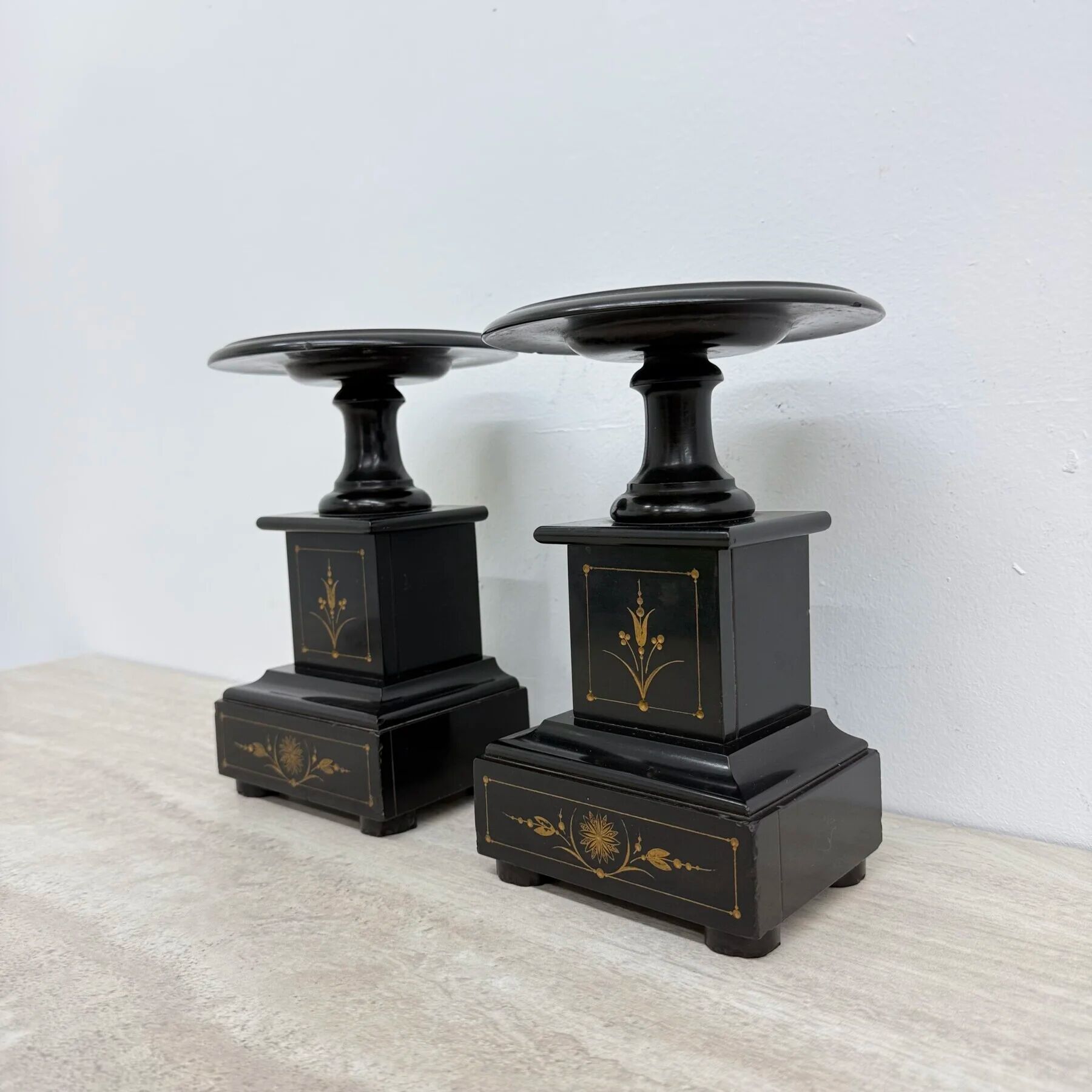 Antique French black marble cassoulets gilt decor pedestals neoclassical pair, 1900s