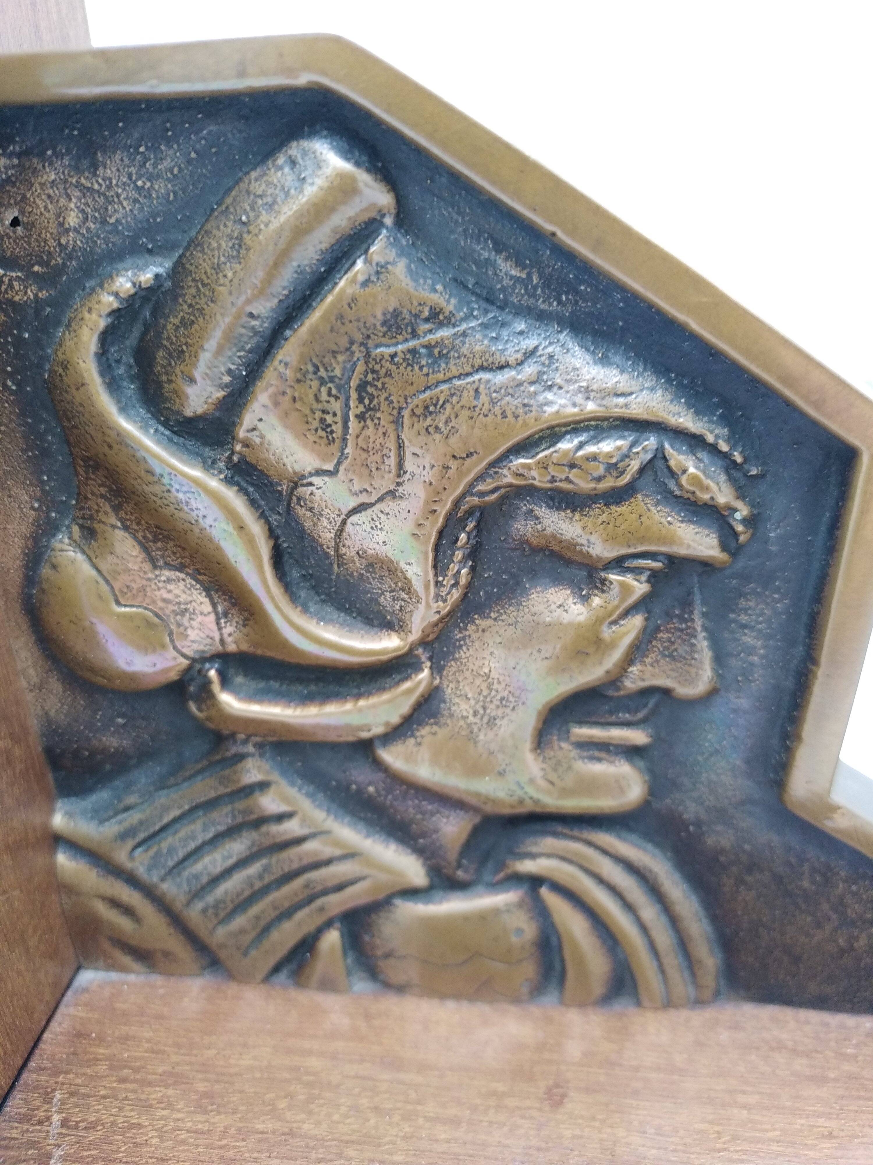 Pair of Breton couple bookends in bronze and wood.