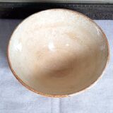 Old bowl in earthenware with floral decoration.