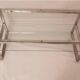1980s coffee table with a double chrome metal top.