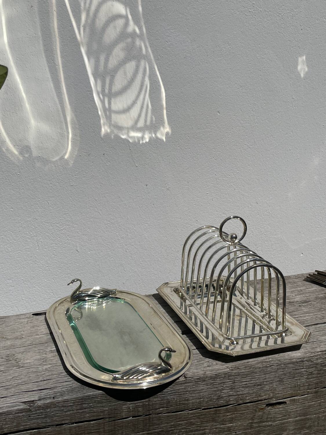 Flat silver metal tray with duck and toast