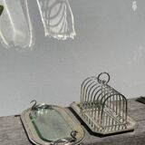 Flat silver metal tray with duck and toast