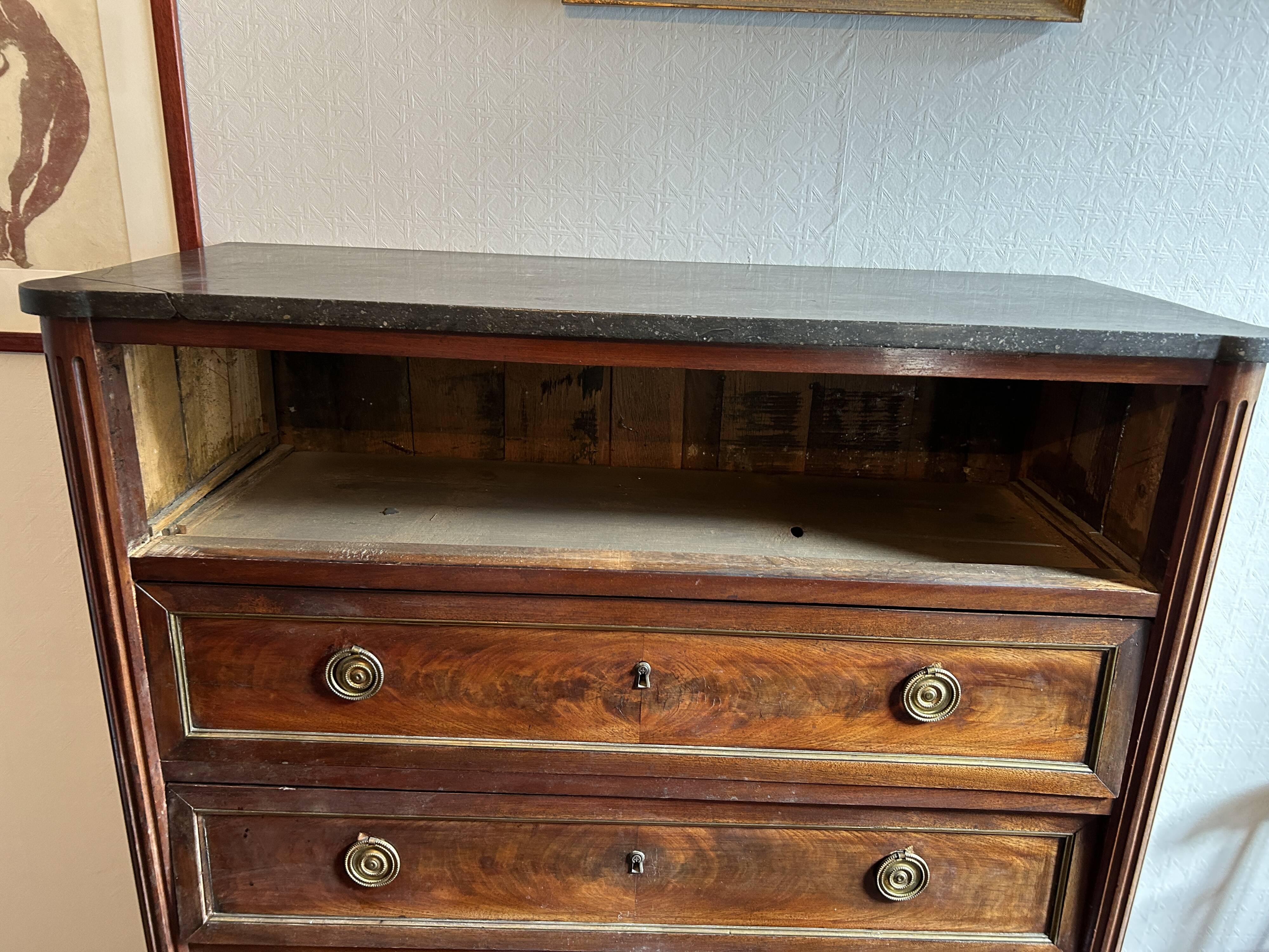 Mahogany and black marble chest of drawers, late 18th-early 19th century