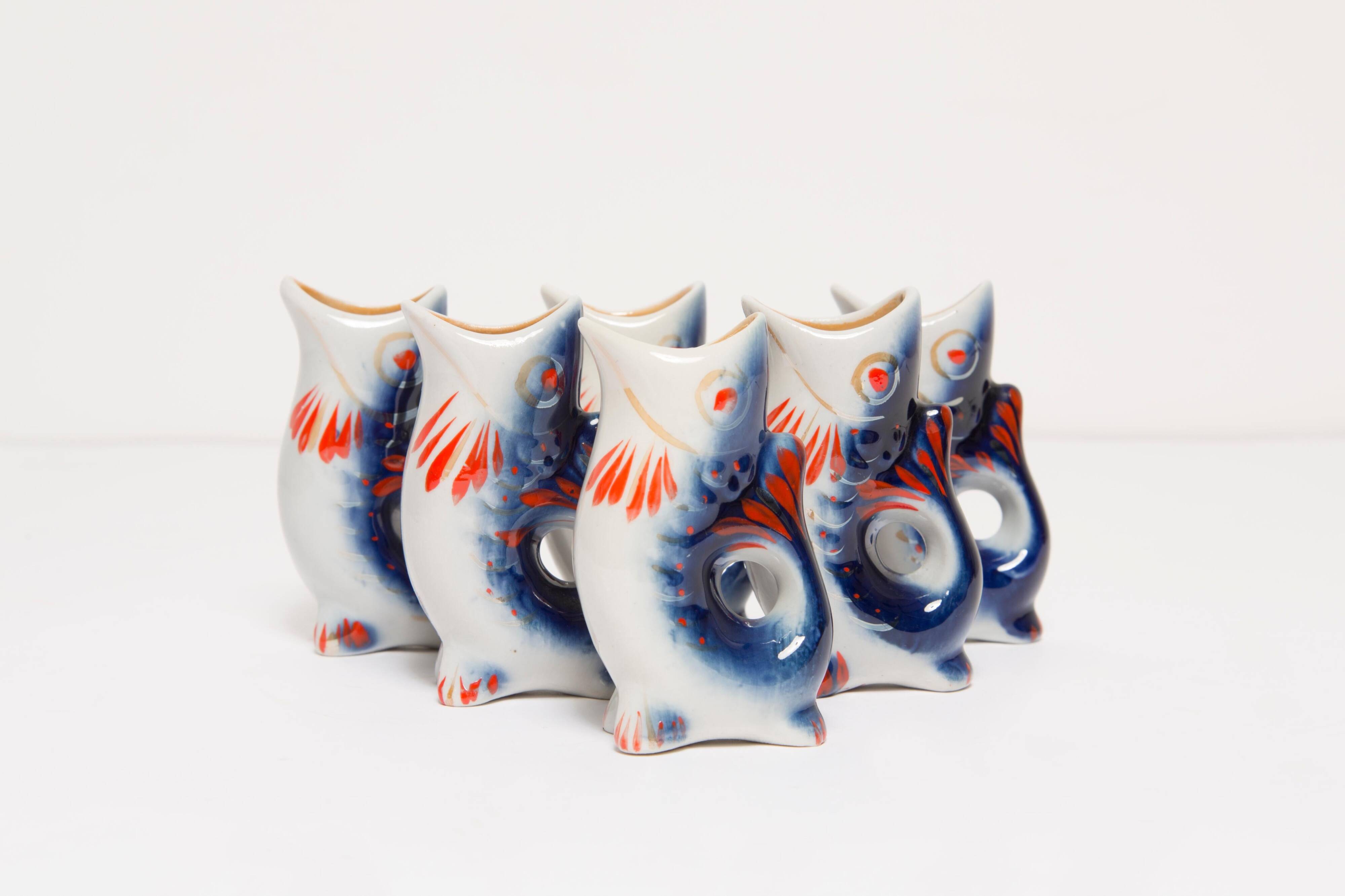 Set of 7 blue glass fish, mid-20th century.