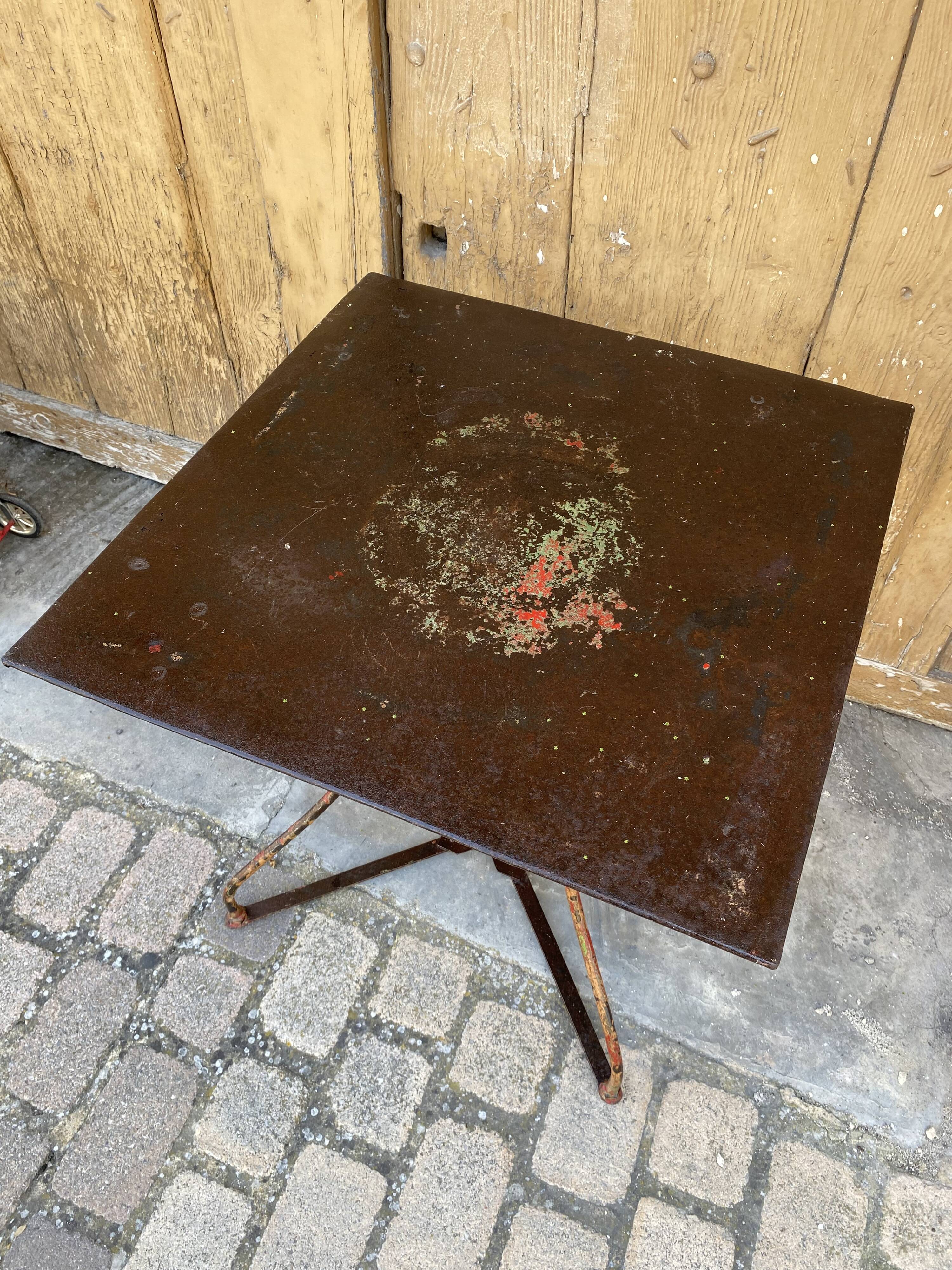 Wrought iron pedestal table