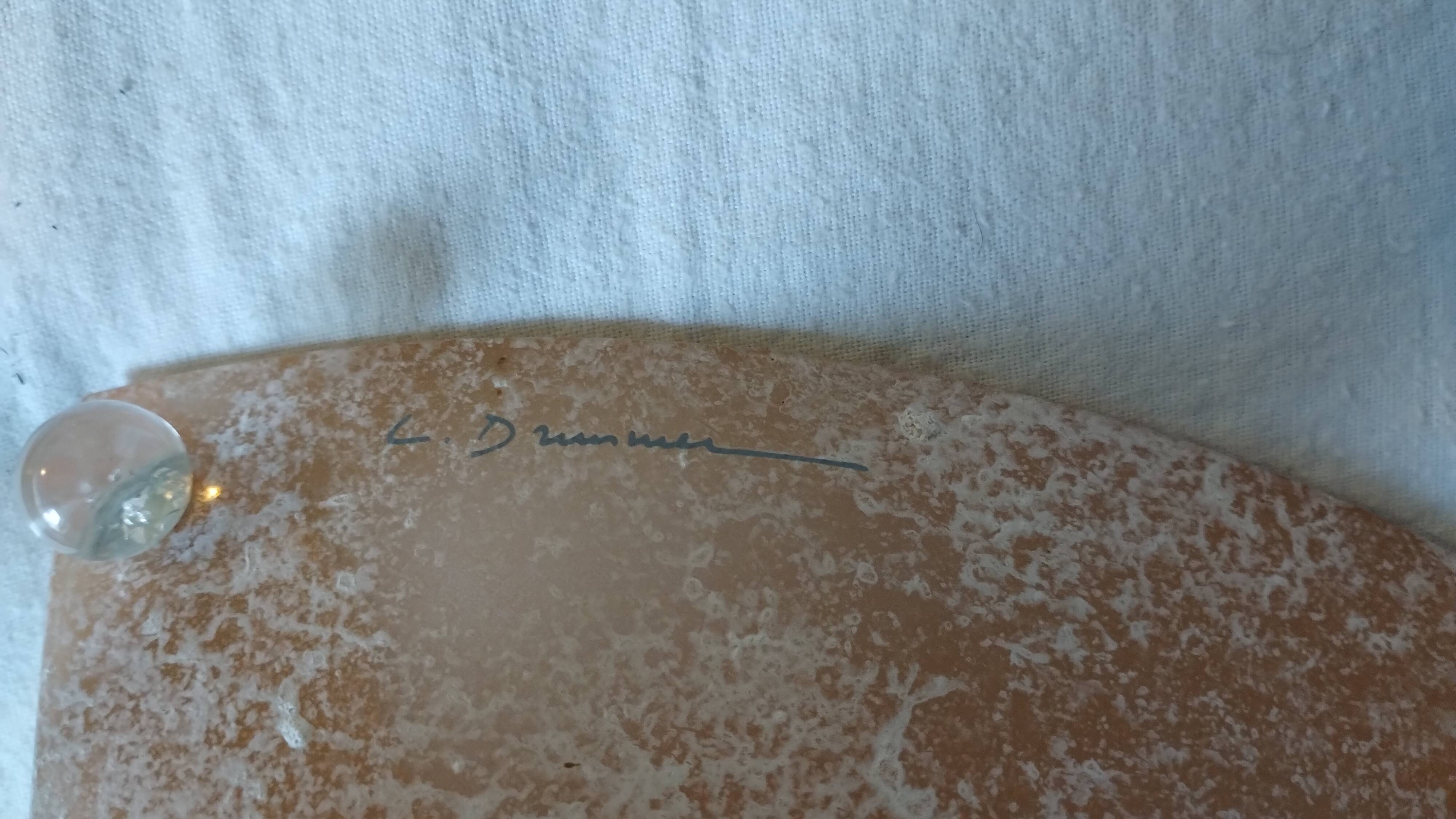 Pair of wall sconces signed L. Drummer