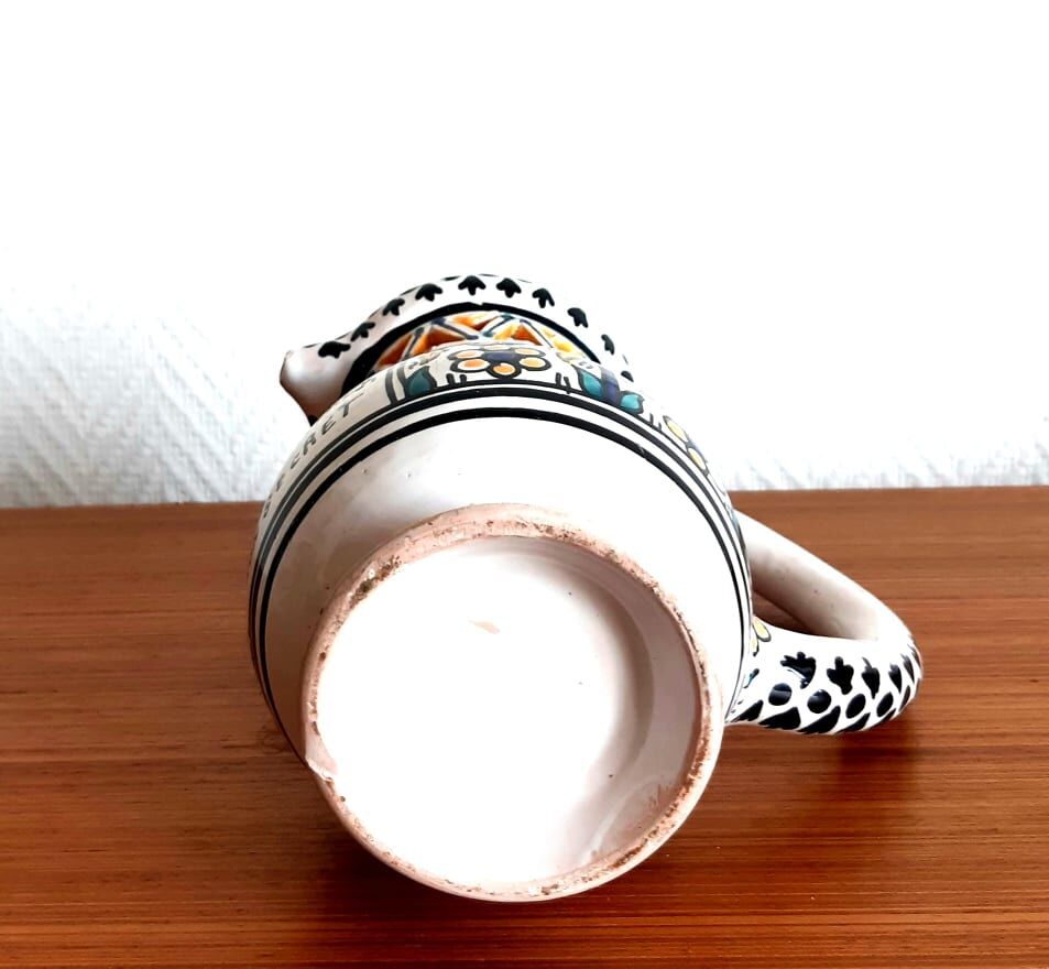 Deceptive pitcher in glazed earthenware