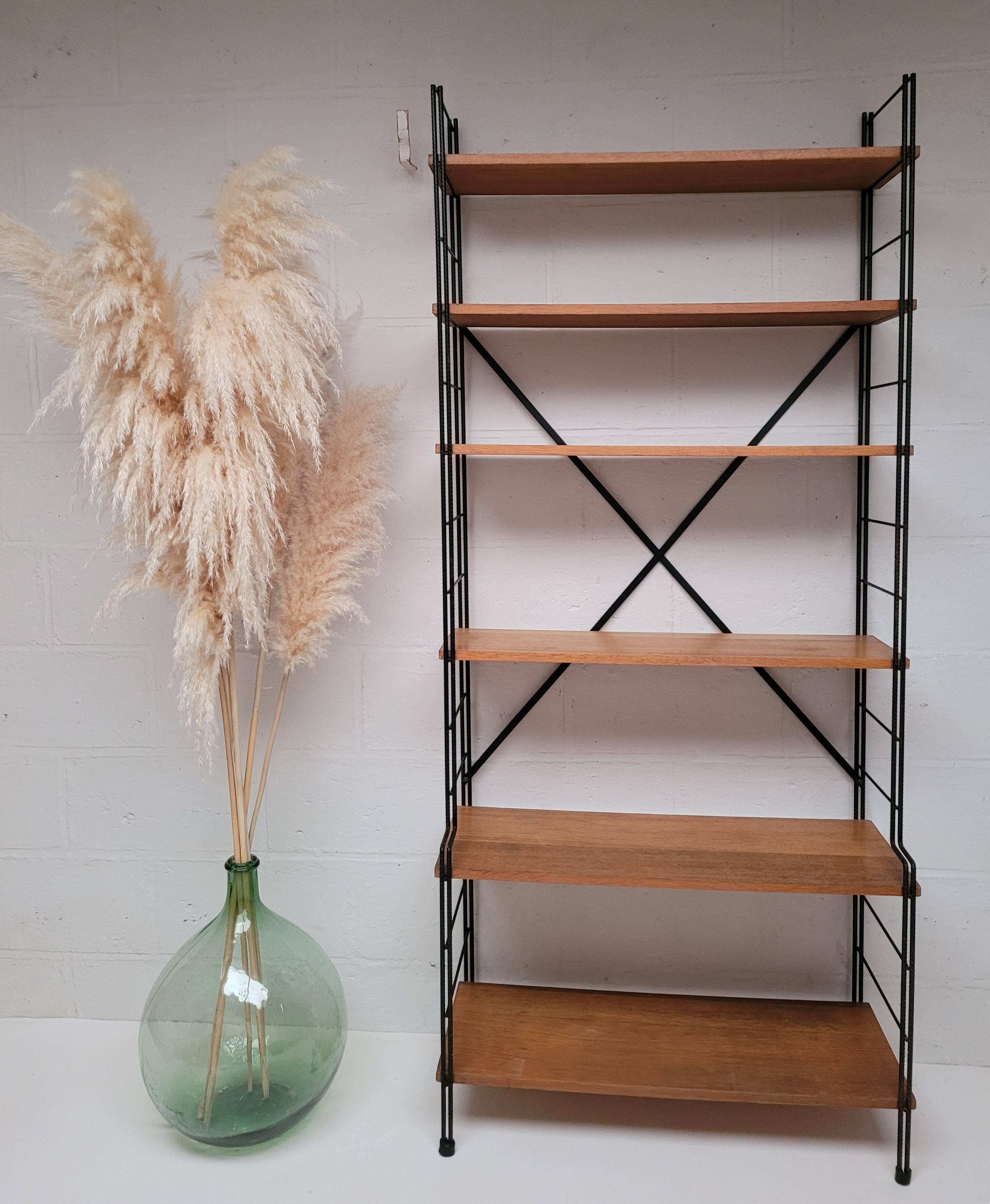 String bookcase on legs from the 50s