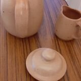 Coffee maker milk jar in sandstone