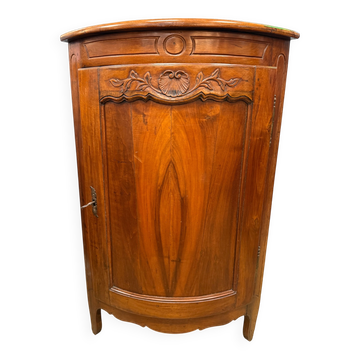 Corner cabinet in walnut in the Louis XV style.