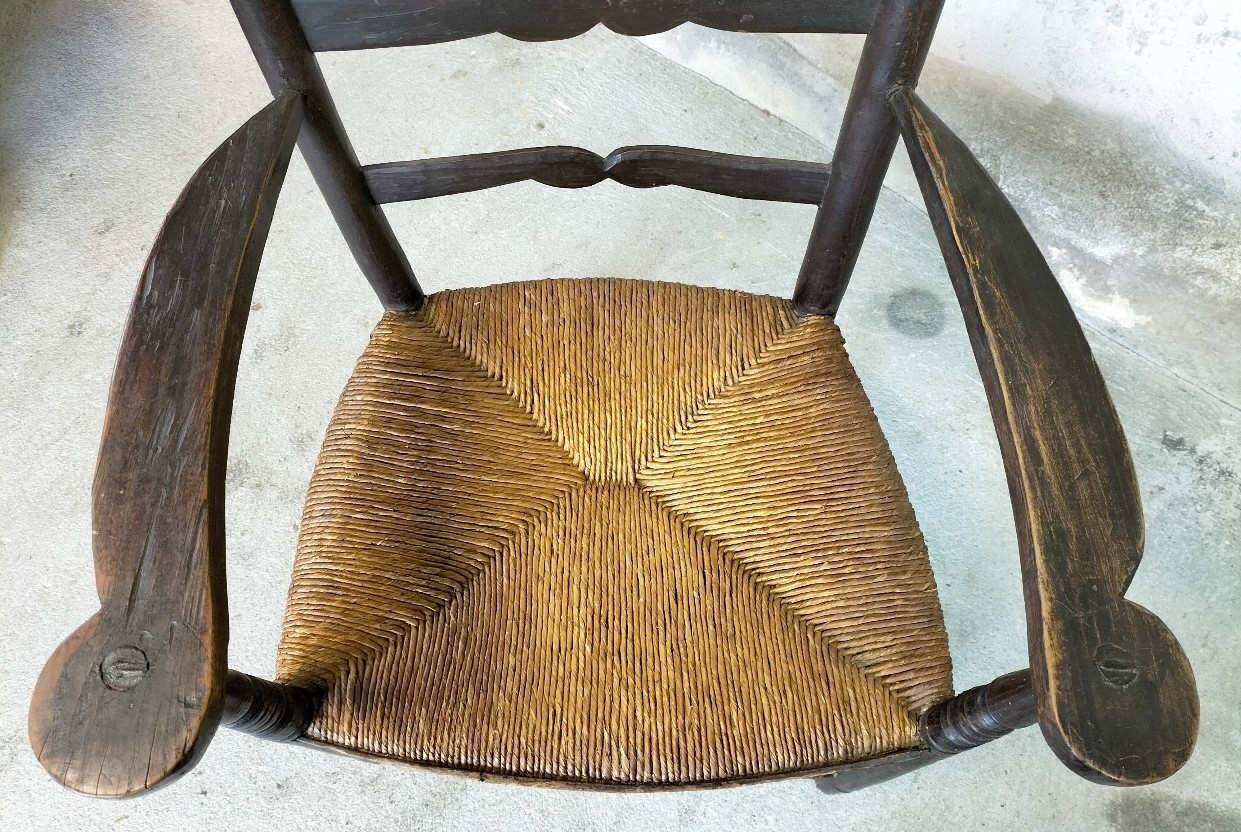 High back straw armchair