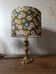brass table lamp | khaki lampshade with multicoloured daisies