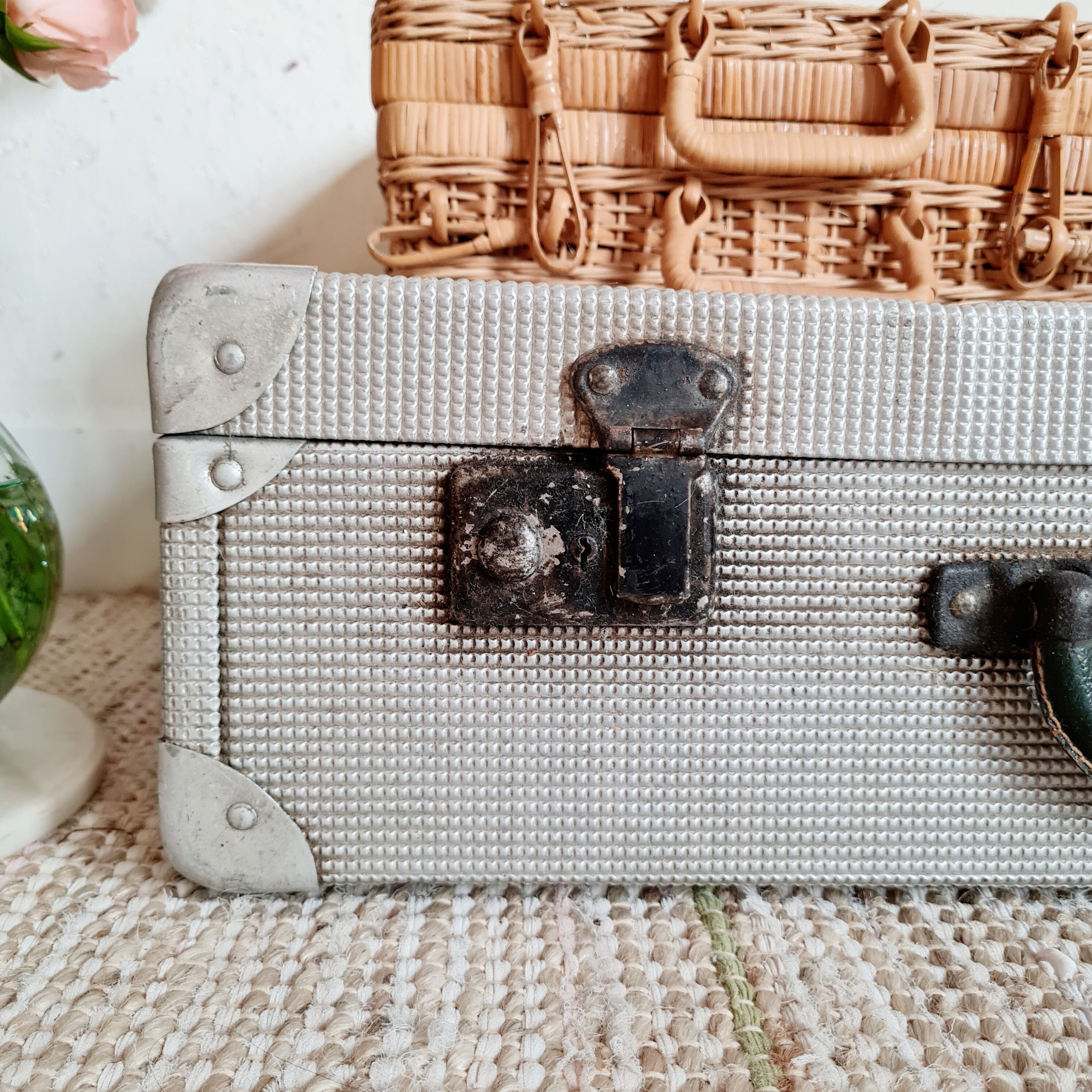 Old metal suitcase green leather handle