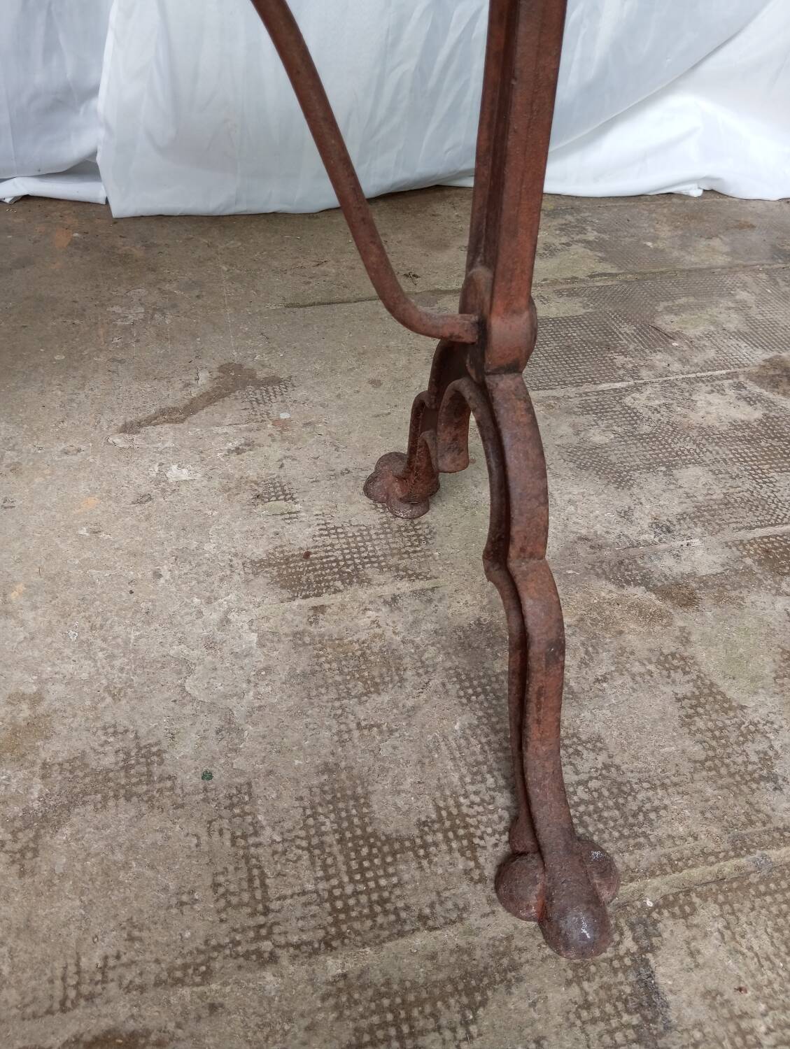 Antique bistro table with lion paws
