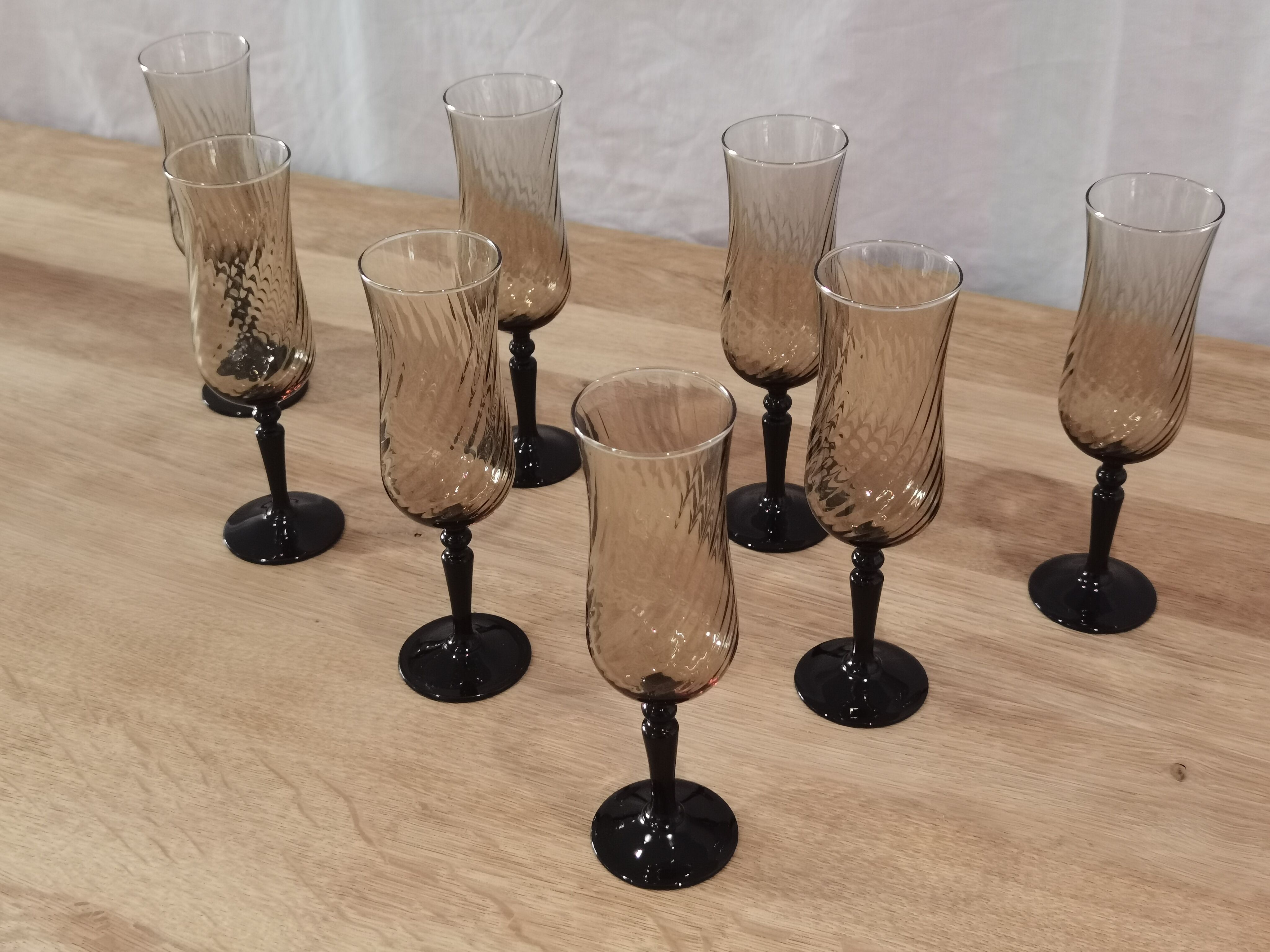 8 vintage smoked champagne flutes with black feet Arcoroc