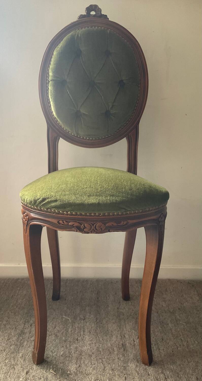 Antique wooden and velvet upholstered chair