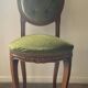Antique wooden and velvet upholstered chair