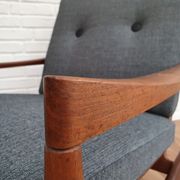 A pair of Danish armchairs, teak, wool, leather