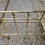 Vintage single bed and nightstand in gilded brass