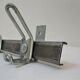 Vintage school wall rack in patinated steel